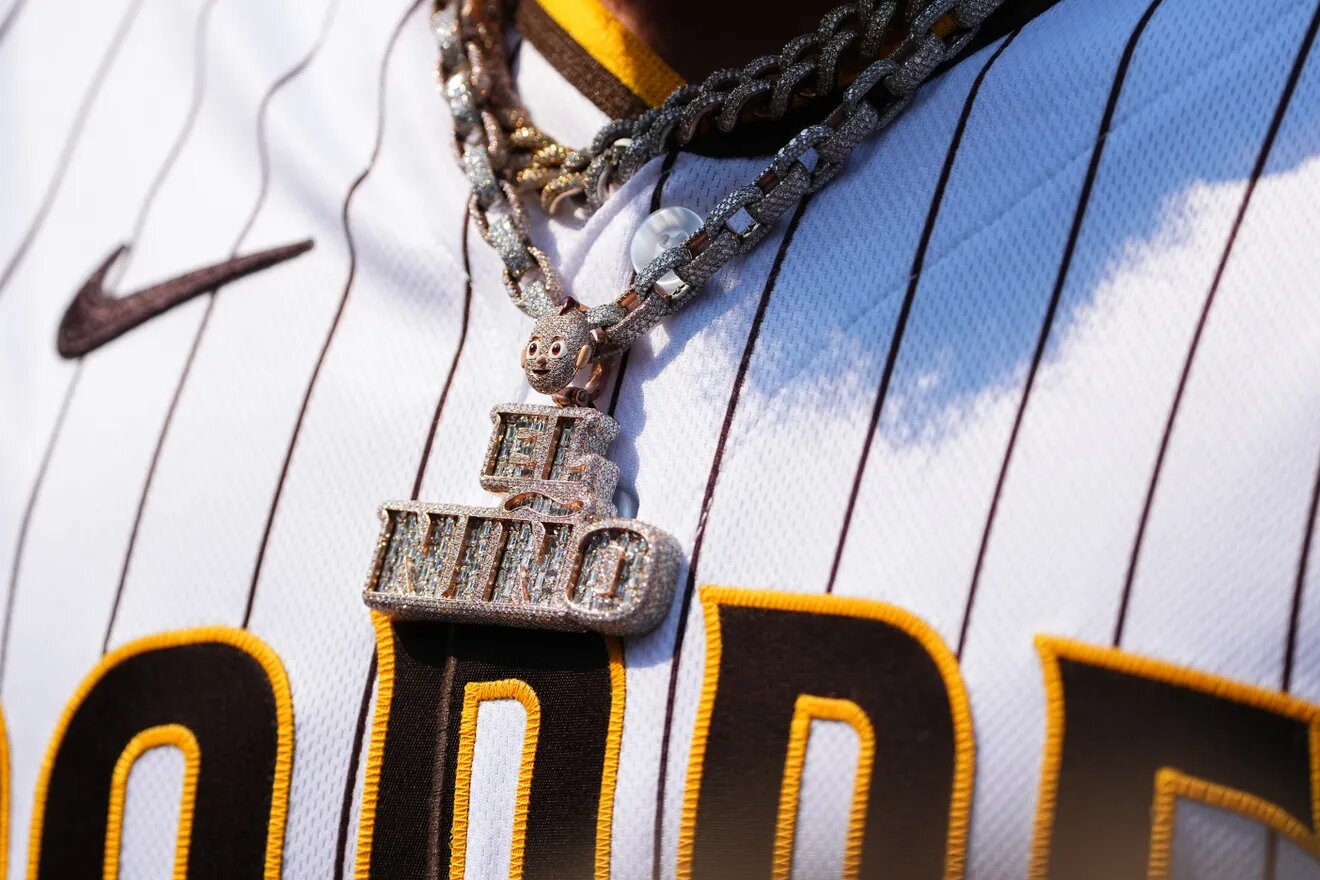 Unbuttoned jerseys and gold chains are part of the White Sox