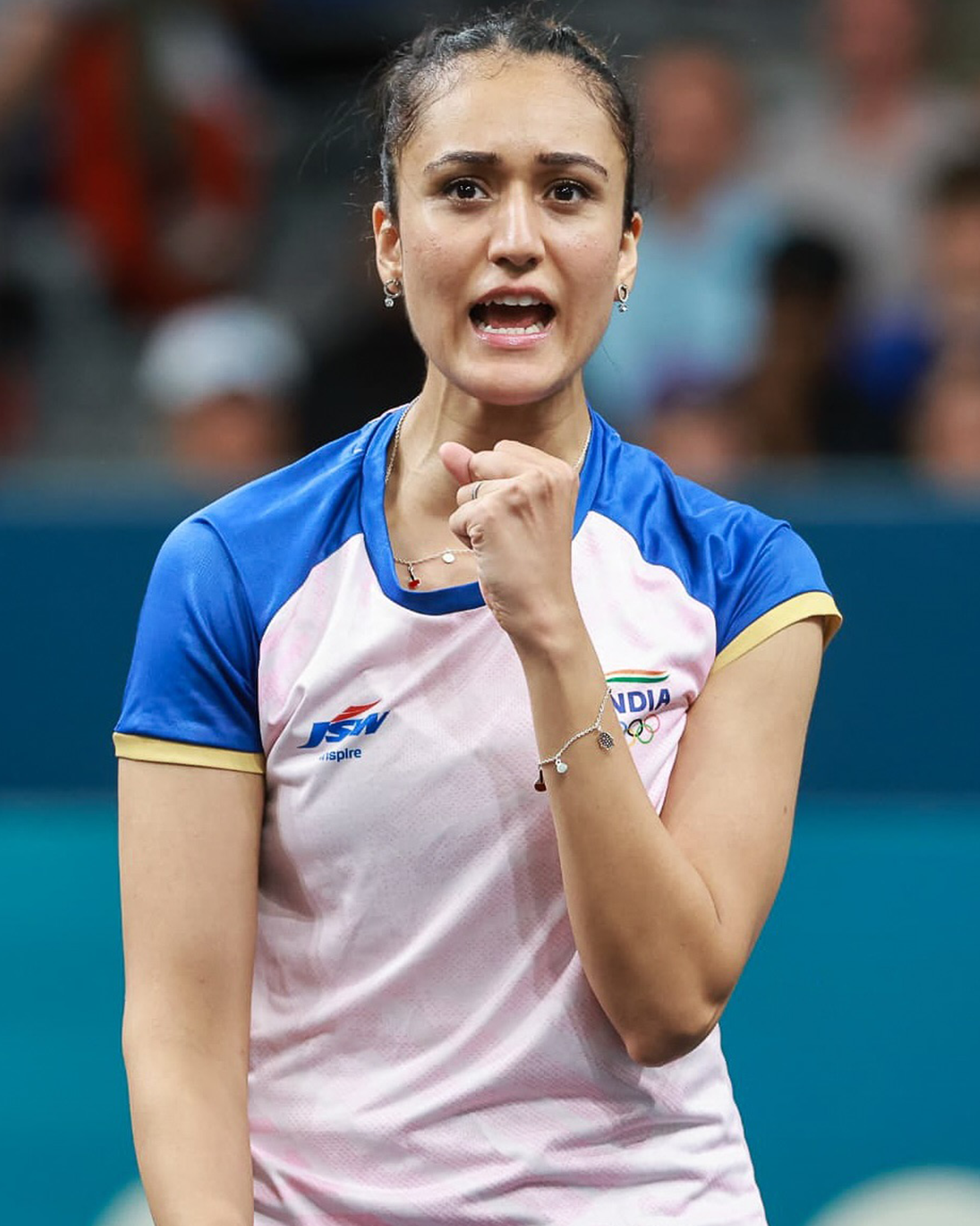 Manika Batra competing in table tennis