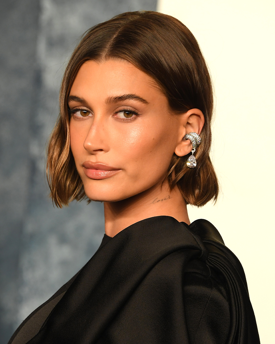 Hailey Bieber wore a natural diamond ear cuff by Ana Khouri named the Phillipa at the 2023 Oscars Vanity Fair Afterparty. 