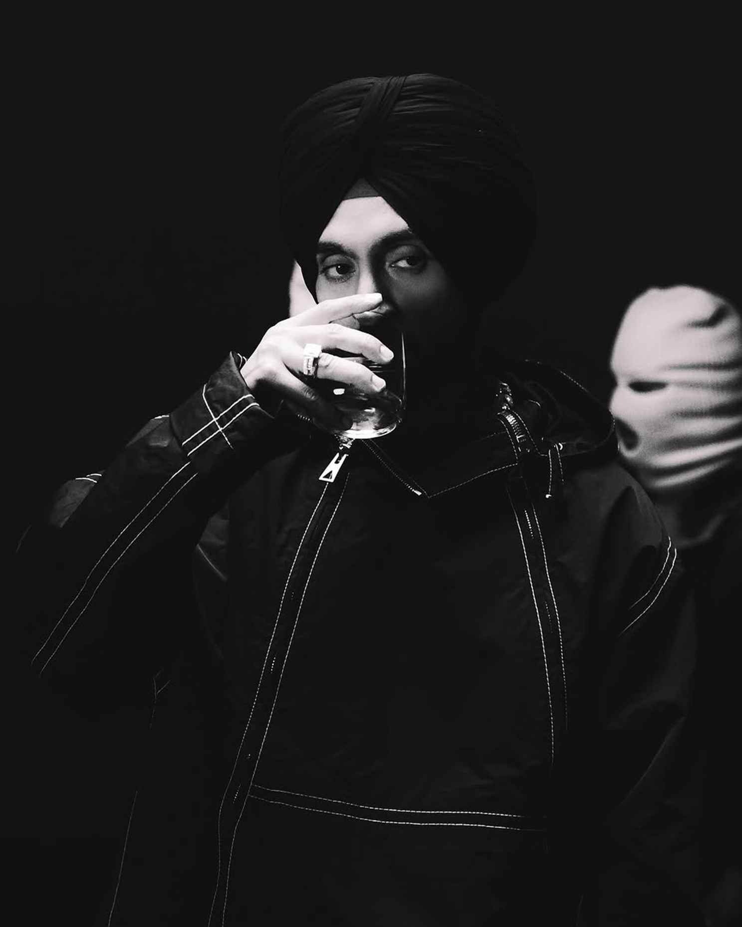 Diljit Dosanjh wearing a bold, diamond chunky ring that enhances his iconic style.