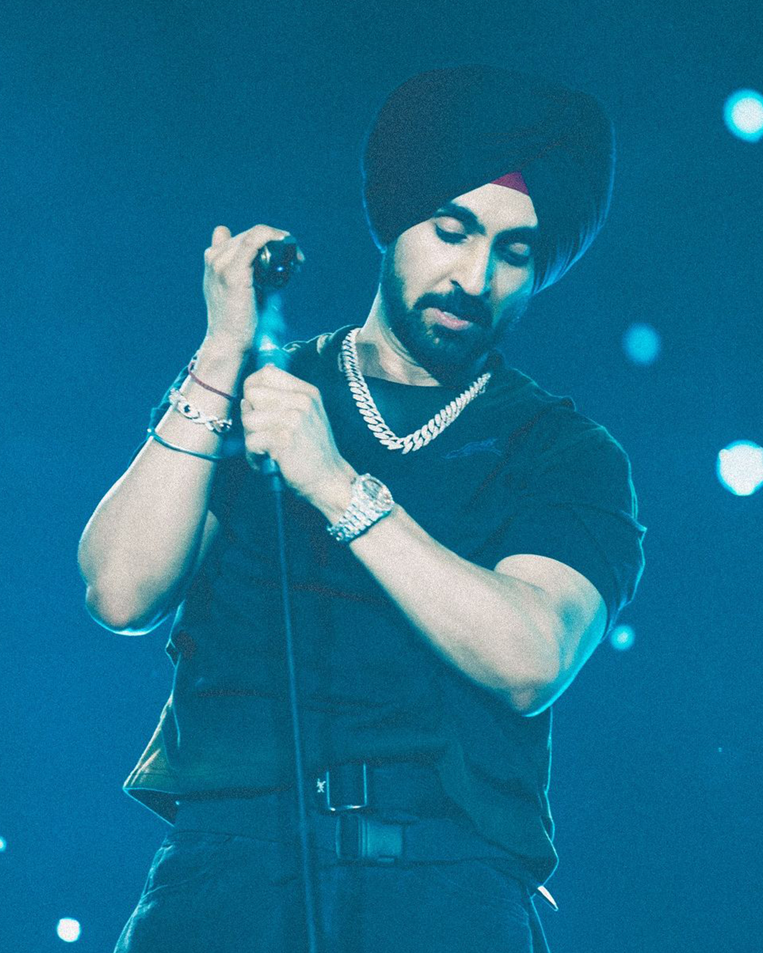 Diljit Dosanjh showcasing a trio of diamond pieces for a refined, cool look.