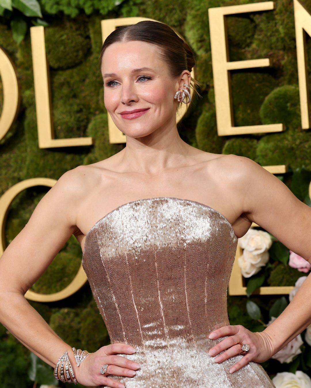 Nobody Wants This star Kristen Bell attends the Golden Globes 2025, wearing REZA diamond jewelry.